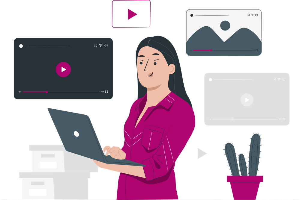 A woman at a laptop surrounded by video players
