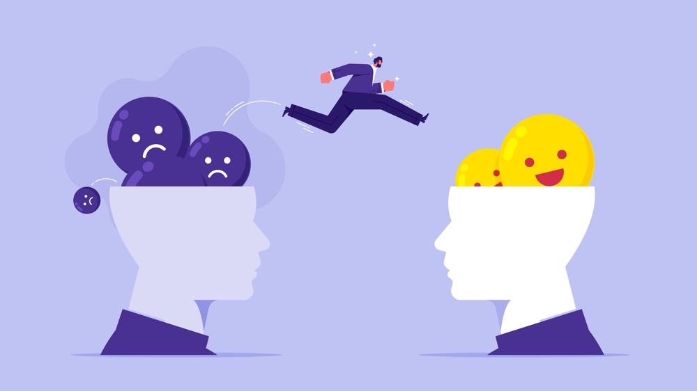 Illustration of a man leaping from a head full of sad faces into a head full of smiling ones