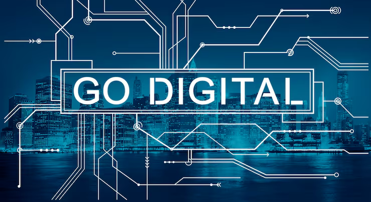 "Go digital" lettering over a night city skyline crossed by circuit lines