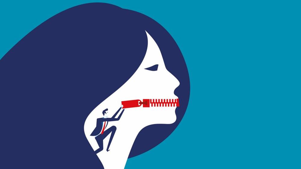 Illustration of a businessman zipping shut a woman's mouth, a symbol of employees silenced at work