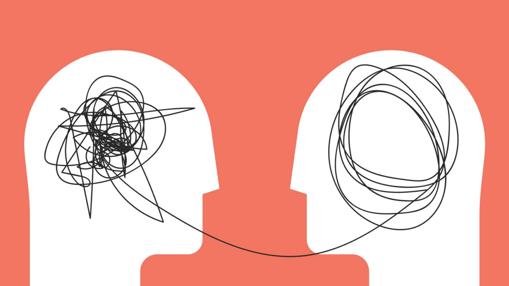 Two head silhouettes joined by one line, tangled in the first head and smoothed into loops in the second