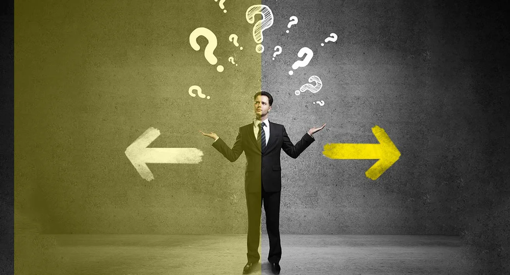 Businessman shrugging between two arrows pointing opposite ways, with question marks floating above his head